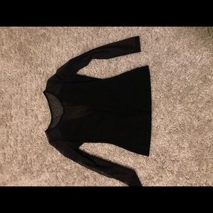 Black shirt with mesh sleeves